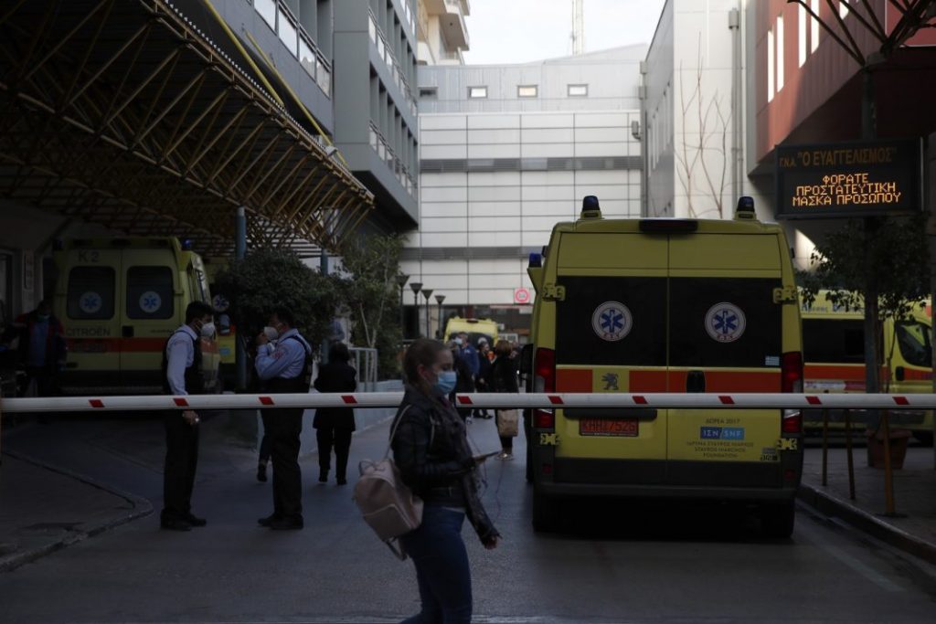 Ambulances are parked at Evangelismos hospital, one of the main public hospital used for treatment of coronavirus cases in Athens, Tuesday, April 6, 2021. Lockdown measures have been in force since early November but an ongoing surge in COVID-19 infections remains high as the country battles to emerge from deep recession. (AP Photo/Thanassis Stavrakis)