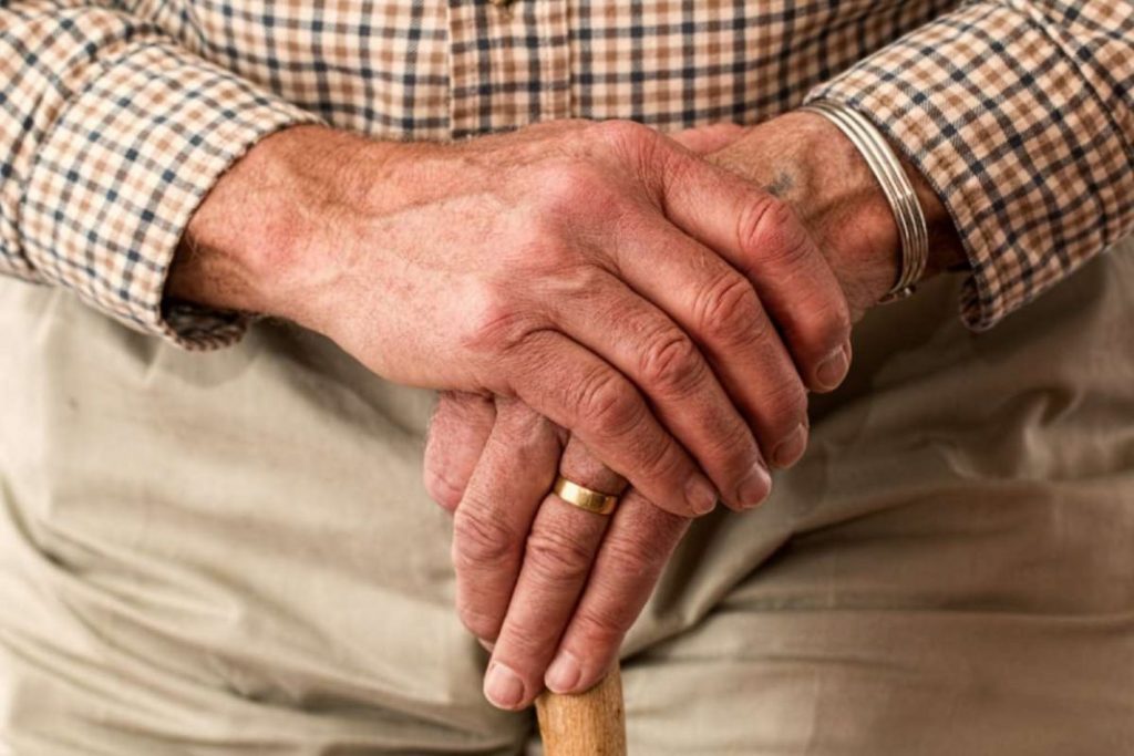hands-walking-stick-elderly-old-person-1068x712