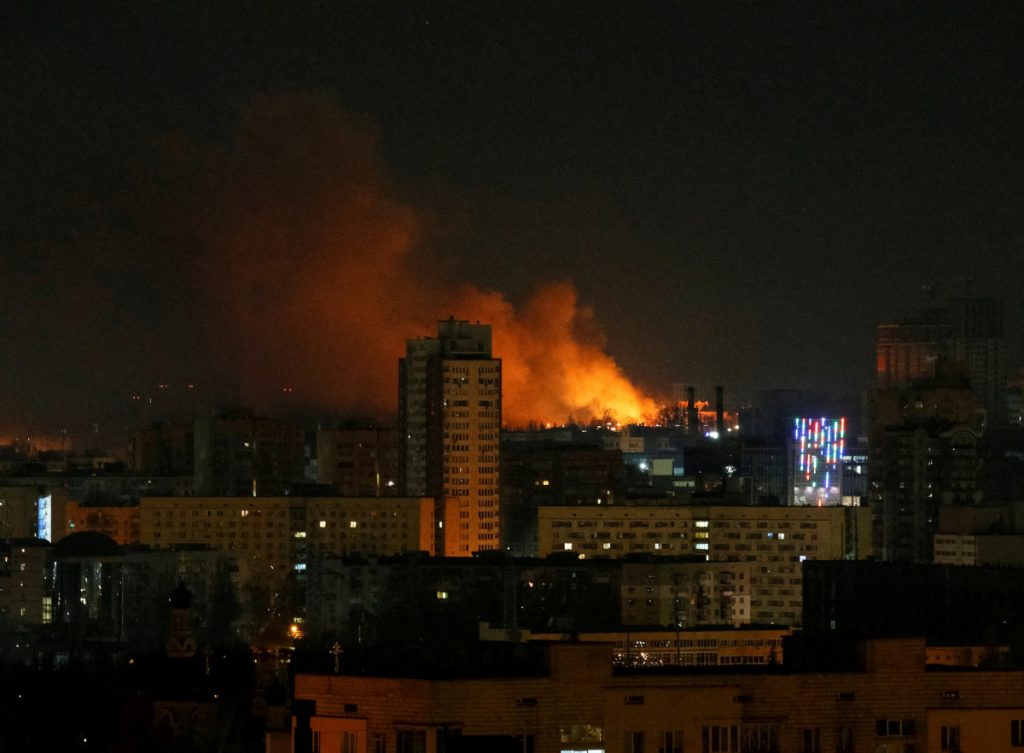 Smoke and flames rise over during the shelling in Kyiv, as Russia continues its invasion of Ukraine February 26, 2022. REUTERS/Gleb Garanich REFILE - CORRECTING LOCATION