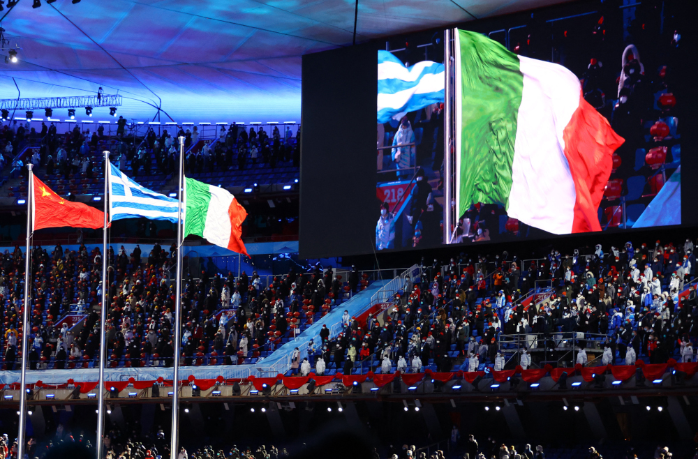 2022 Beijing Olympics - Closing Ceremony - National Stadium, Beijing, China - February 20, 2022. China, Greece and Italy flags are pictured during the closing ceremony. REUTERS/Fabrizio Bensch