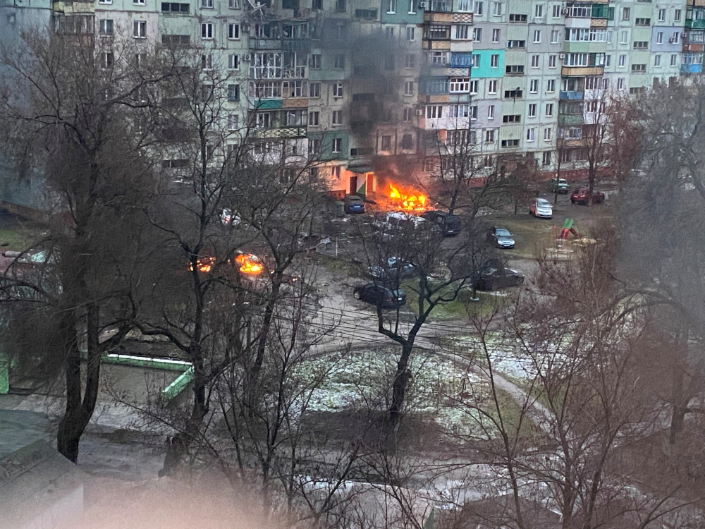 Fire is seen in Mariupol at a residential area after shelling amid Russia's invasion of Ukraine March 3, 2022, in this image obtained from social media. Twitter @AyBurlachenko via REUTERS ATTENTION EDITORS - THIS IMAGE HAS BEEN SUPPLIED BY A THIRD PARTY. MANDATORY CREDIT