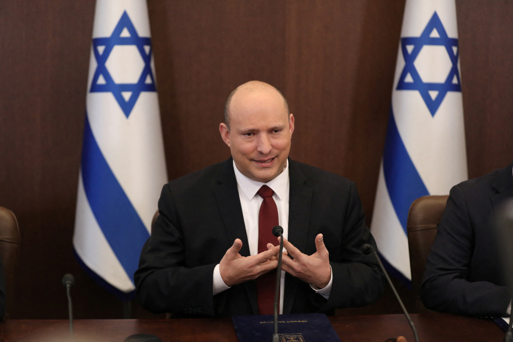Israeli Prime Minister Naftali Bennett speaks during a cabinet meeting at the Prime Minister's office in Jerusalem, March 27, 2022. Abir Sultan/Pool via REUTERS