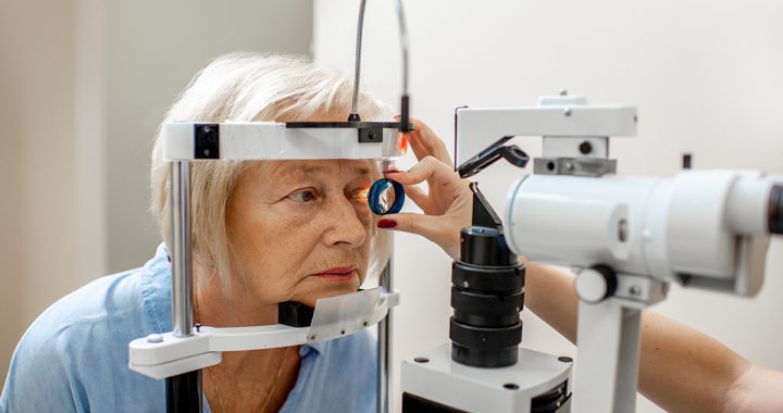 Senior woman during a medical eye examination with microscope in the ophthalmologic office