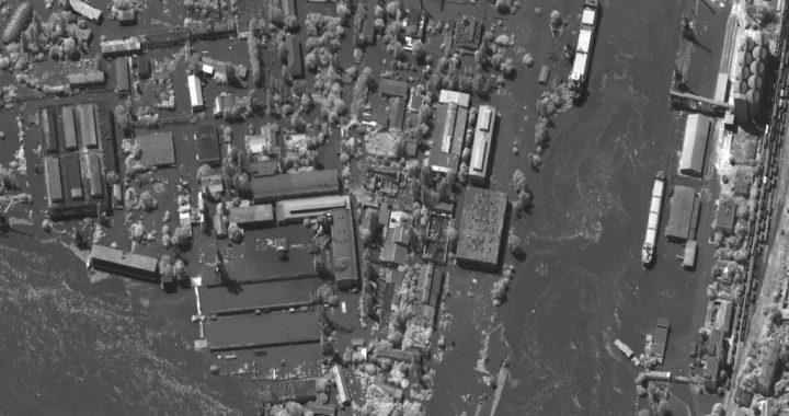 This satellite image provided by Maxar Technologies shows flooded port facilities and industrial area in Kherson, southern Ukraine on Tuesday, June 6, 2023. (Maxar Technologies via AP)